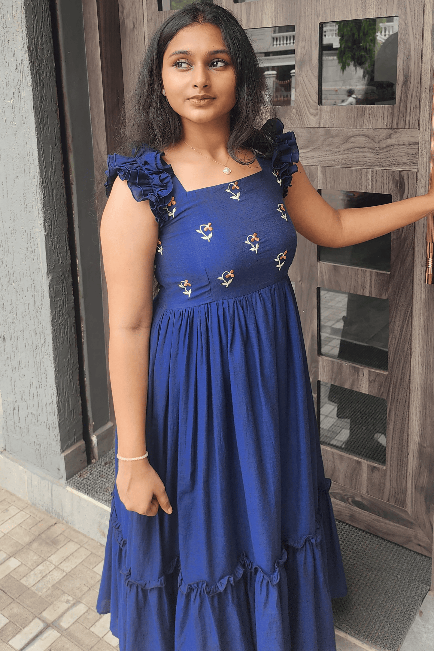 Handwoven Jamdani Dress – Floral Embroidered Yoke & Ruffle Sleeves